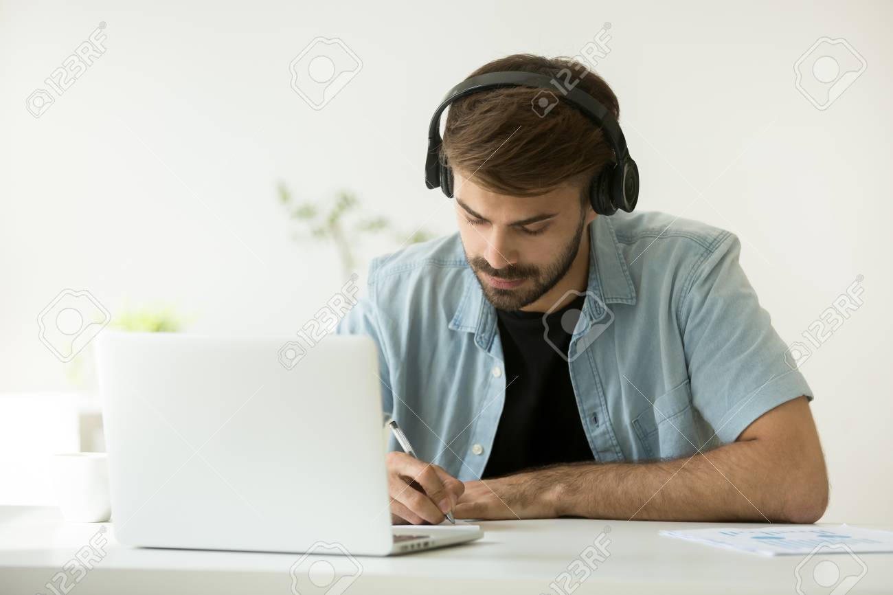 Learner studying online with headphones
